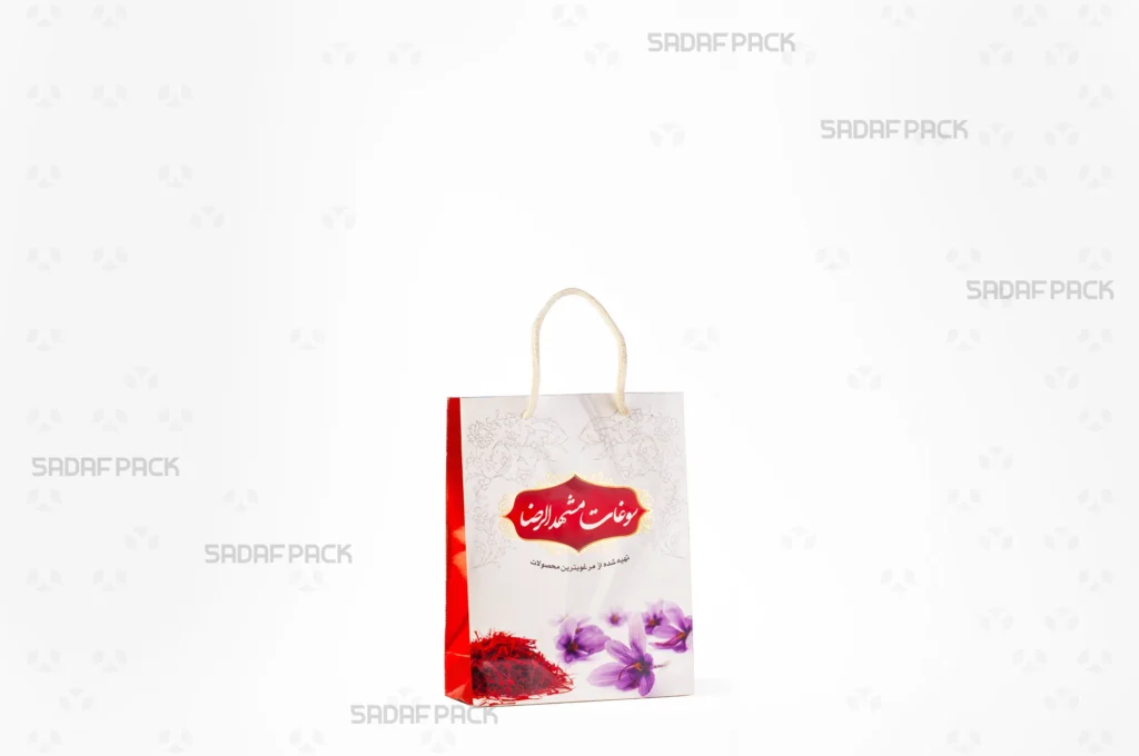 ساک دستی مقوایی 17×22 سانتی‌متر صدف پک با طرح مذهبی و سوغاتی با دسته طناب مناسب بسته‌bندی هدیه محصولات زعفران و سوغات خراسان