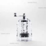 نمای روبروی زعفران ساب مروارید طرح دار صدف پک، دارای بدنه کریستالی شفاف برای مشاهده محتویات، به همراه درپوش و دسته فلزی با آبکاری کروم و مکانیزم سایش چرخشی برای پودر کردن یکنواخت زعفران